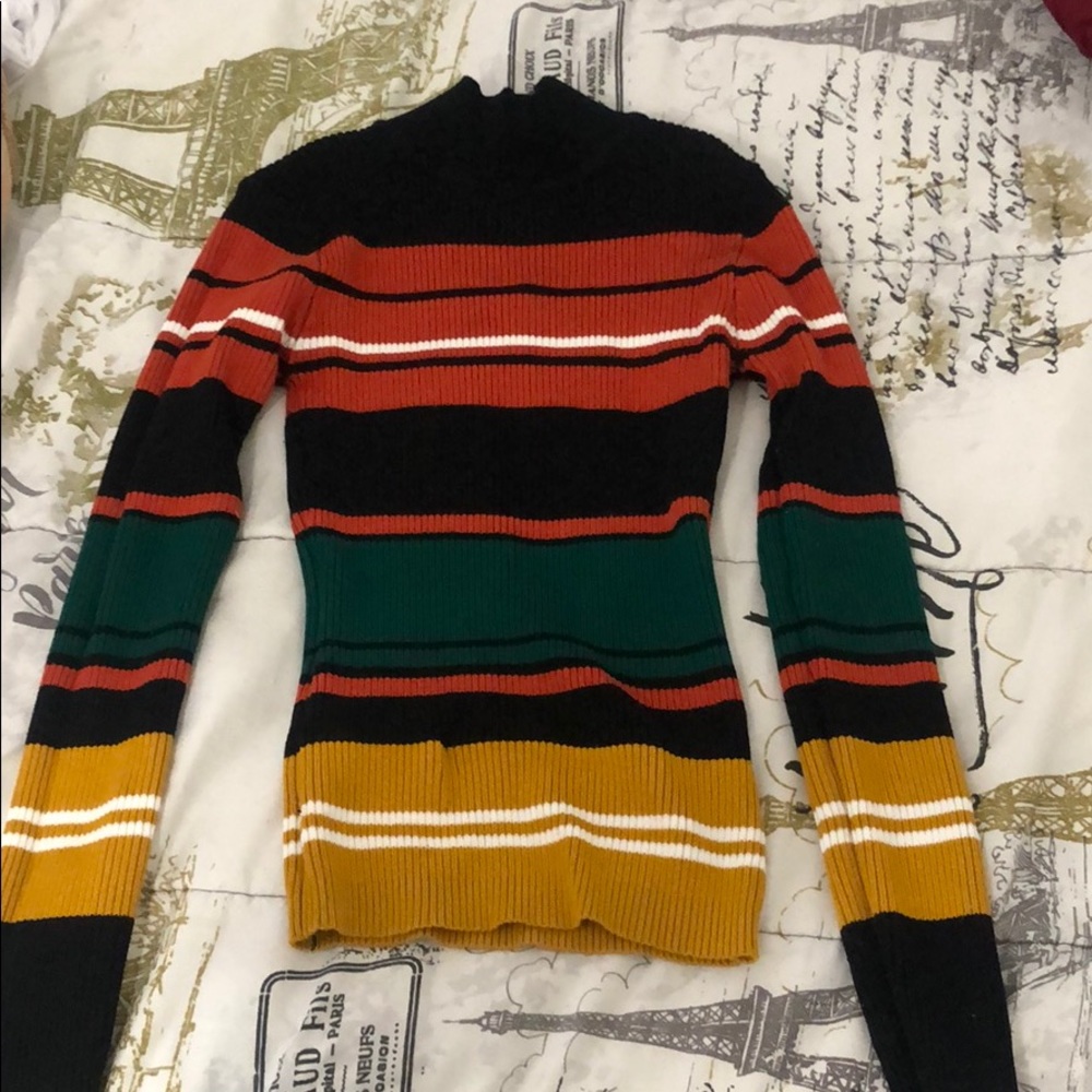 a turtle neck shirt